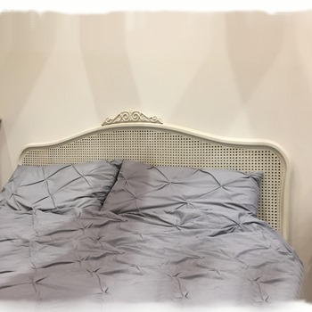 French inspired grey rattan headboard